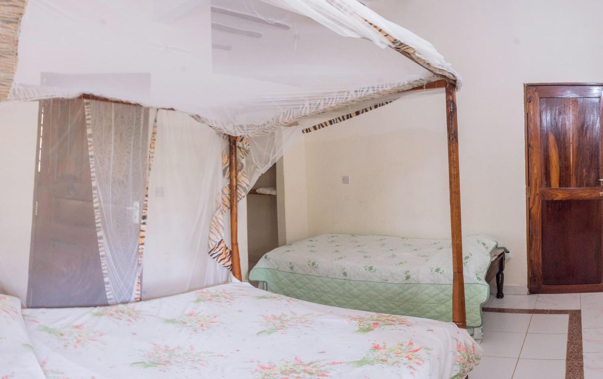 Kijani Cottages In Diani ディアニ・ビーチ エクステリア 写真