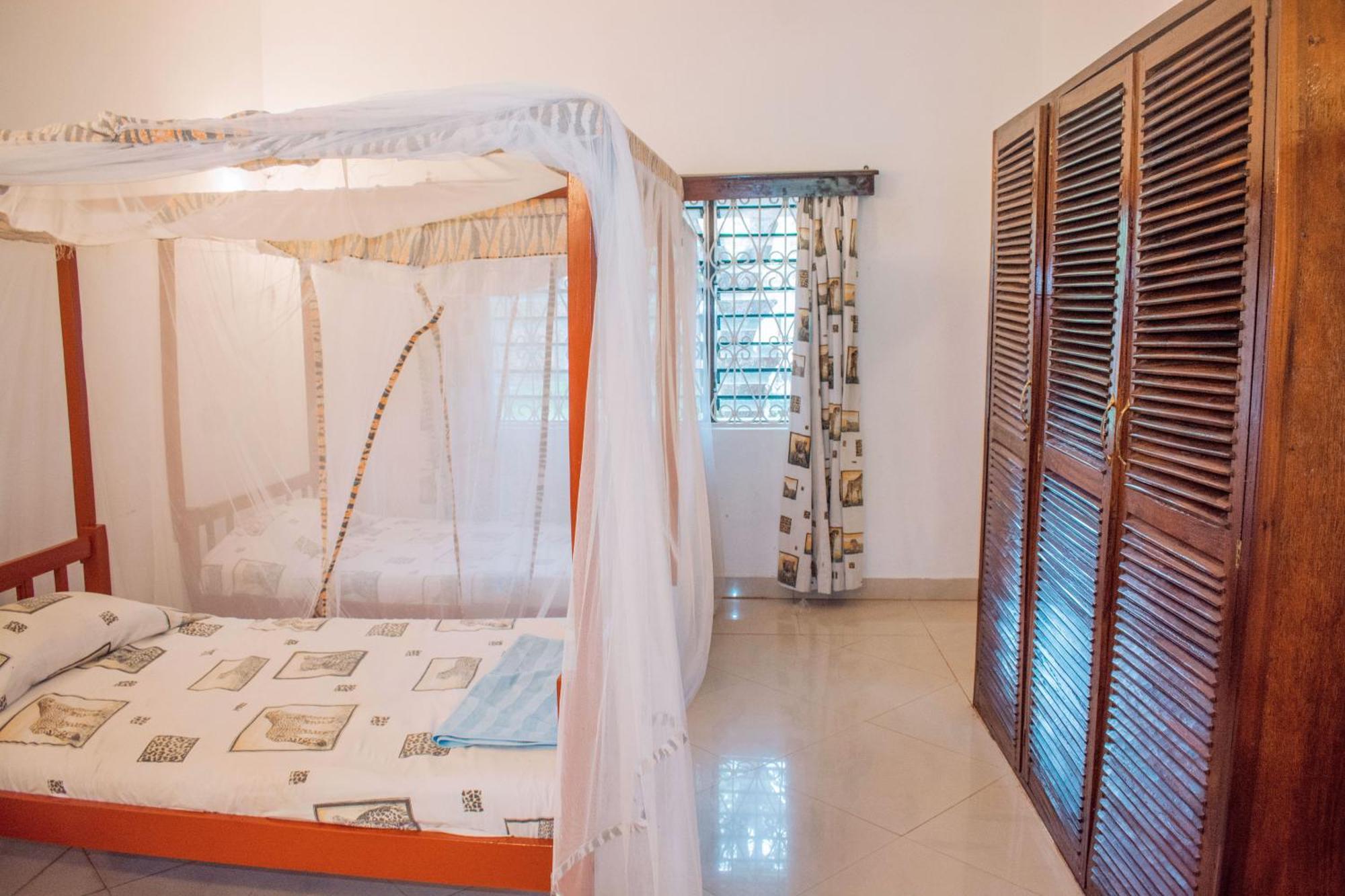 Kijani Cottages In Diani ディアニ・ビーチ エクステリア 写真