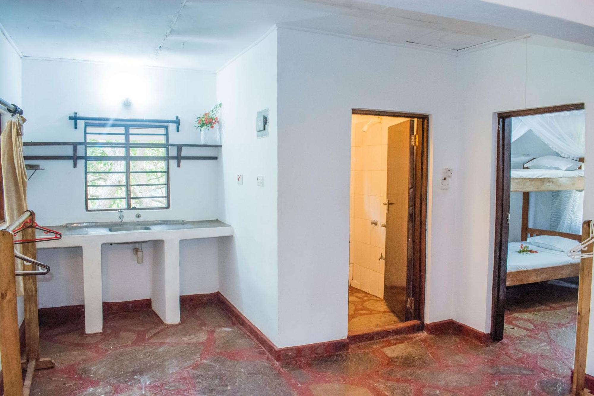 Kijani Cottages In Diani ディアニ・ビーチ エクステリア 写真