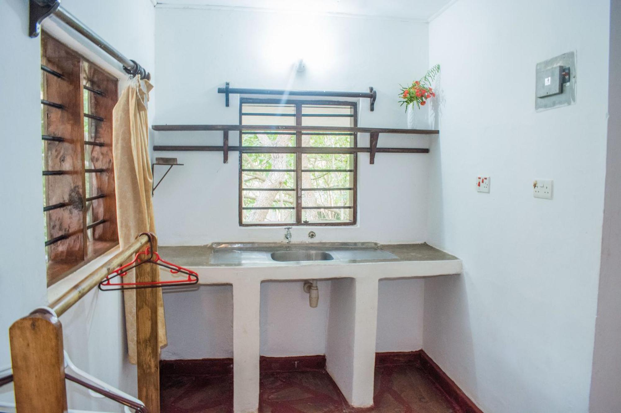 Kijani Cottages In Diani ディアニ・ビーチ エクステリア 写真