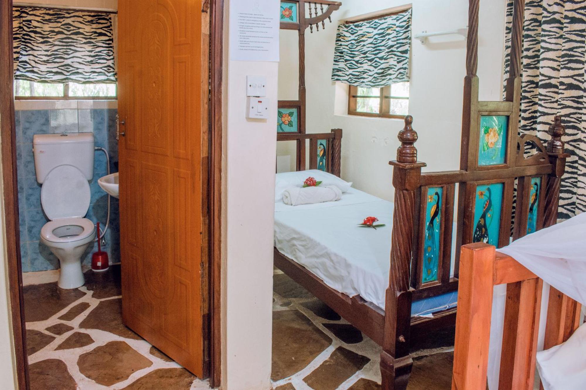 Kijani Cottages In Diani ディアニ・ビーチ エクステリア 写真