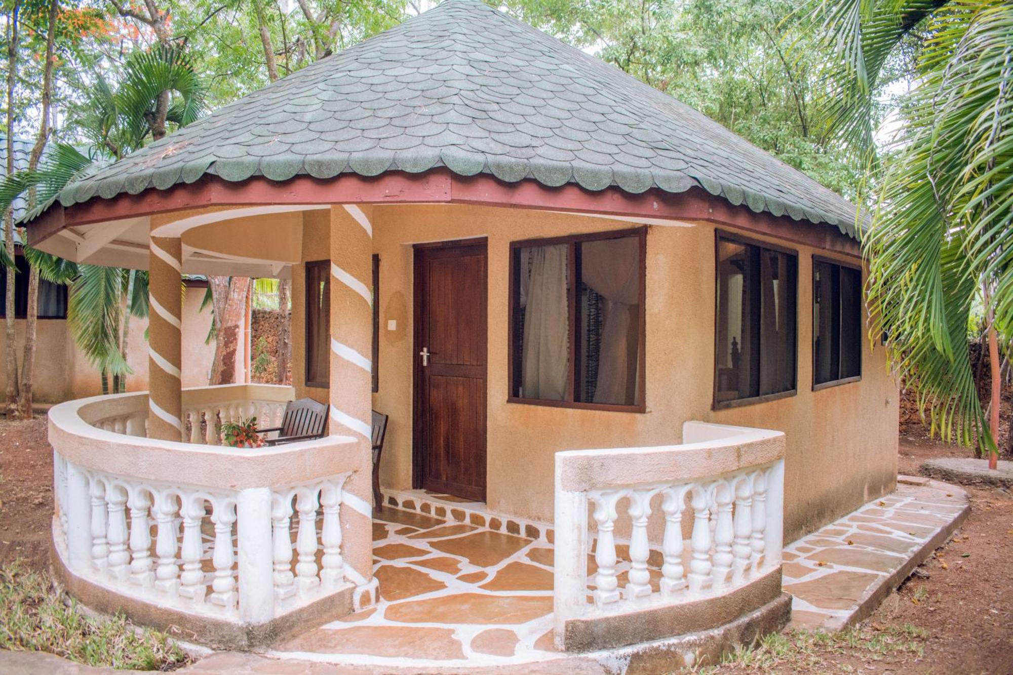 Kijani Cottages In Diani ディアニ・ビーチ エクステリア 写真