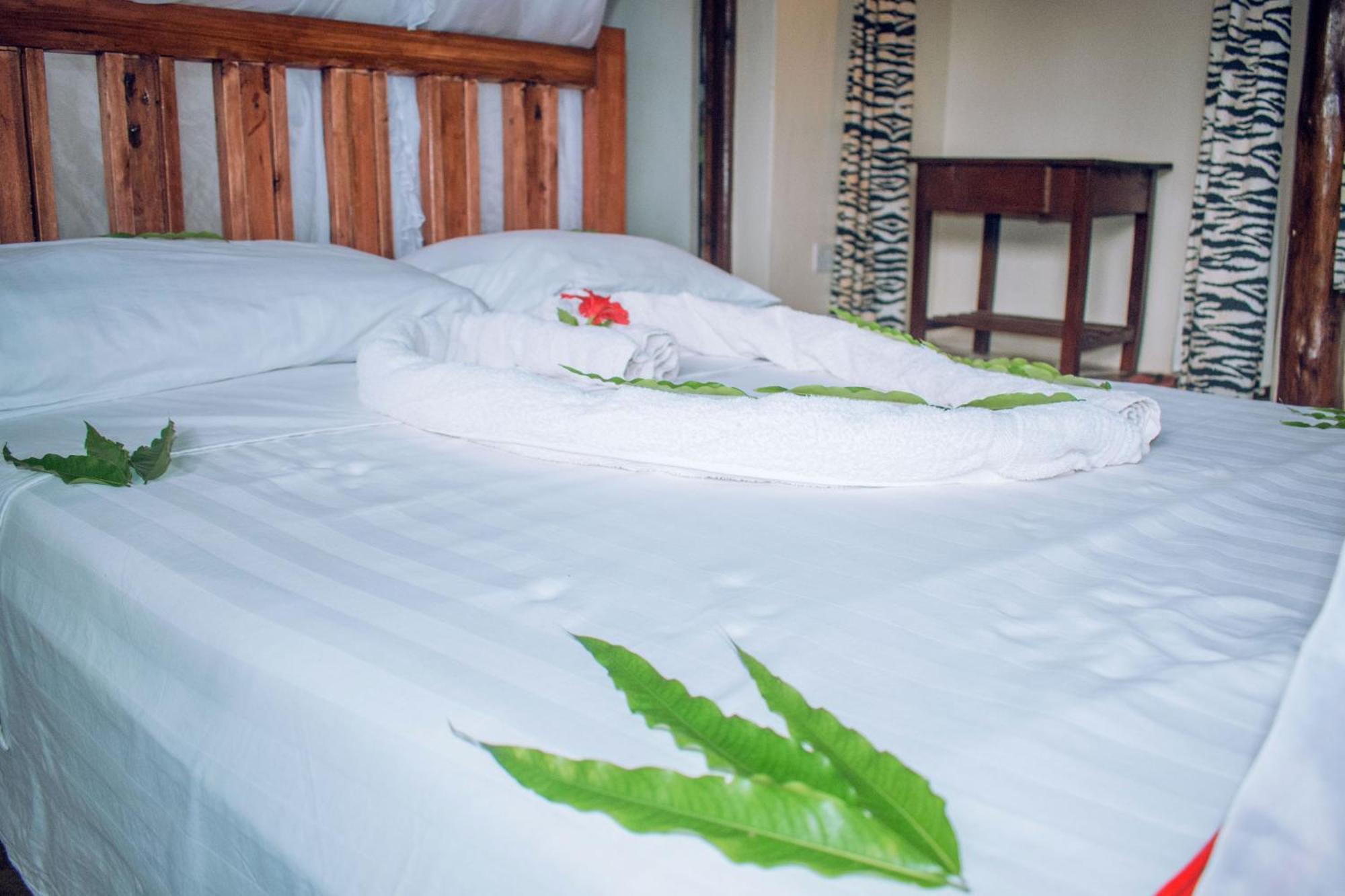 Kijani Cottages In Diani ディアニ・ビーチ エクステリア 写真